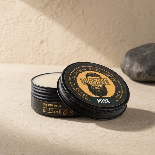 Diggn'It Misk Arabian Beard Balm open tin on a pale mineral surface