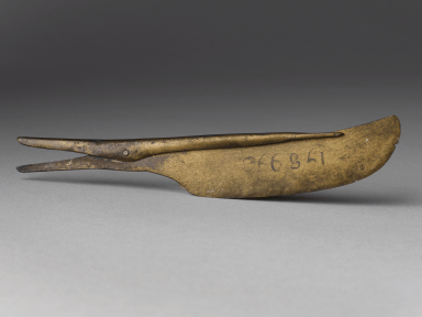 Curling tongs used to refine Mesopotamian beards